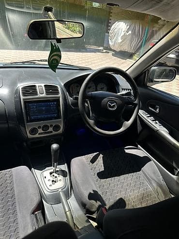 атего 1229: Mazda Familia: 1998 г., 1.8 л, Автомат, Бензин, Универсал — 9