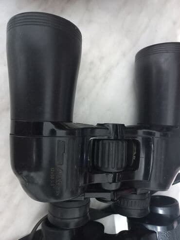 Набор из трех биноклей различных моделей и характеристик. Включает