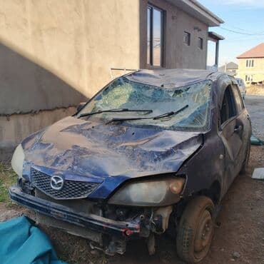 шины на фронтальный погрузчик: Mazda Demio, хэтчбек, правый руль. Цвет темно‑синий. Особенности и — 3