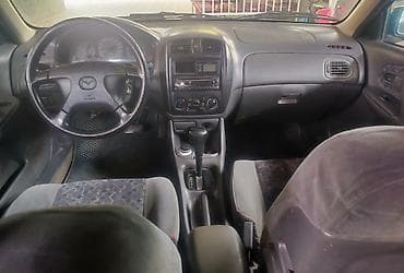 jac 9: Mazda 323: 1998 г., Автомат, Бензин, Хэтчбэк — 3