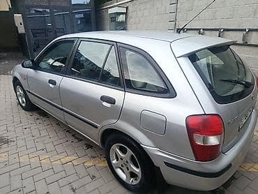 бакту долонотуу: Mazda 323: 2000 г., 1.5 л, Кол менен иштөөчү, Бензин, Хетчбек — 4