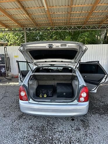 yamaha n max: Mazda 323: 2003 г., 1.6 л, Механика, Бензин, Хэтчбэк — 9