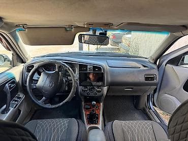 Nissan Primera: 2001 г., 2 л, Механика, Газ, Универсал — 7