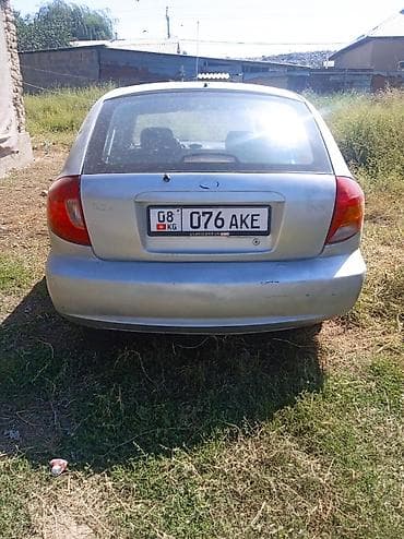 боковой грабиль: Kia Rio: 2005 г., 1.5 л, Механика, Бензин, Хэтчбэк — 1