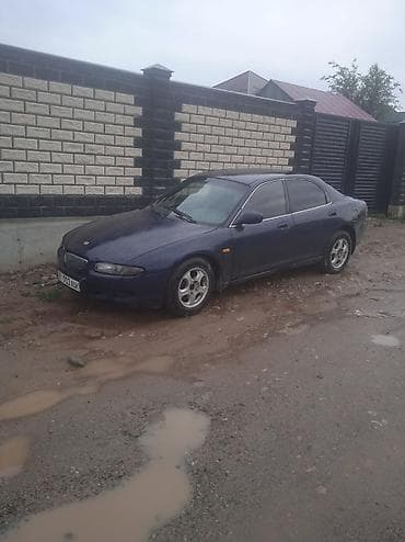 bye e5: Mazda XEDOS 6: 1994 г., 1.6 л, Механика, Бензин, Седан — 3
