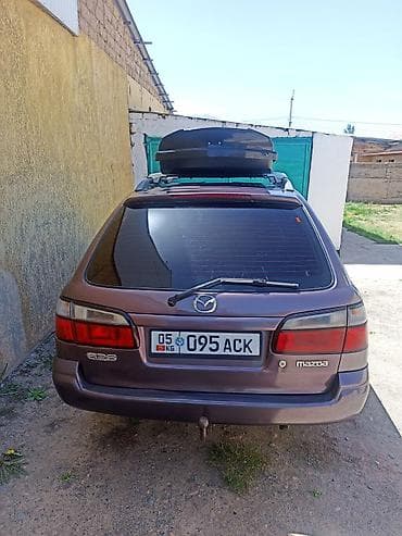 сг 9: Mazda 626: 1999 г., 1.8 л, Механика, Бензин, Универсал — 5