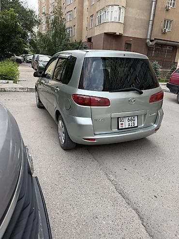 mazda: Mazda Demio: 2003 г., 1.3 л, Автомат — 6