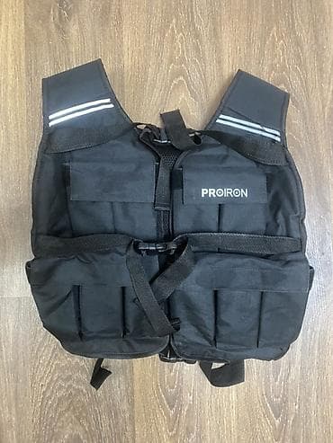 безрукав: Другие жилеты Стандарт, цвет - Черный — 1