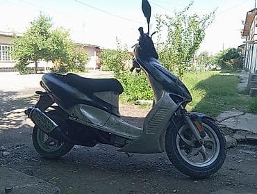 Скутер 50–125 см³ (визуально класс 50сс) с автоматической трансмиссией