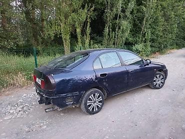 lancer: Mitsubishi Lancer: 1996 г., Механика, Седан — 5