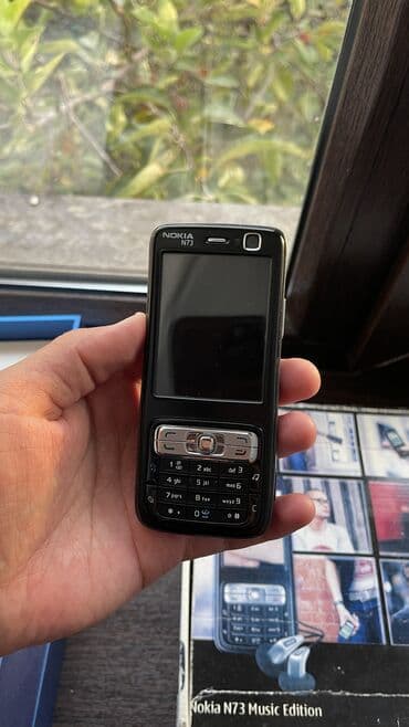 простые телефоны: Nokia N73, Б/у, < 2 ГБ, цвет - Черный, 1 SIM — 5