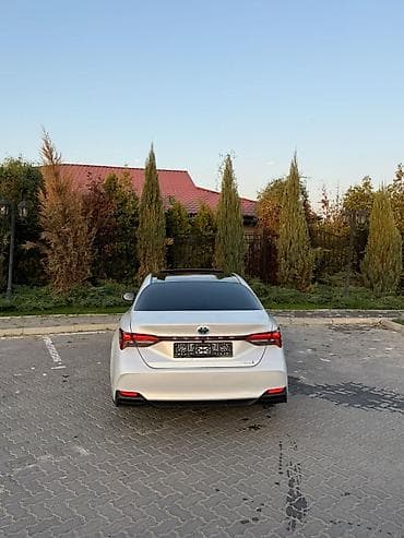 tayota karina e: Toyota Avalon: 2020 г., 2.5 л, Вариатор, Гибрид, Седан — 5