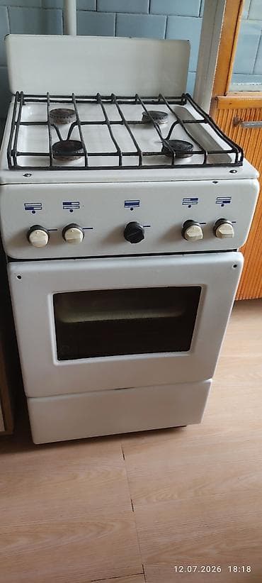 Газовая плита с духовкой, классический белый корпус. Характеристики
