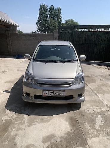 юмузу трактор: Toyota Raum: 2003 г., Автомат, Бензин — 1