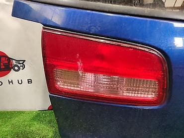 либера: Фонарь крышки багажника NISSAN LIBERTY M12 2 2003 лев. (б/у) — 1
