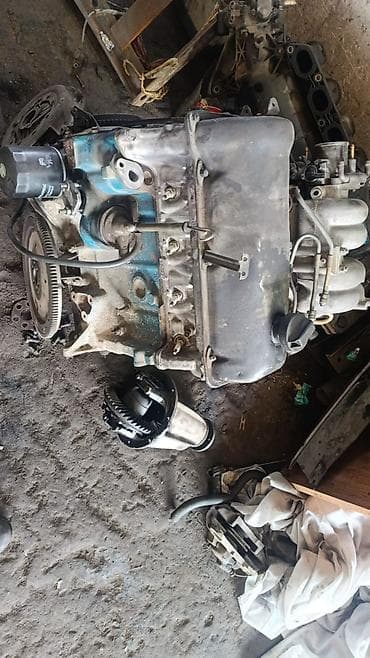 бензин: Двигатель внутреннего сгорания (рядный 4‑цилиндровый) с навесным — 2