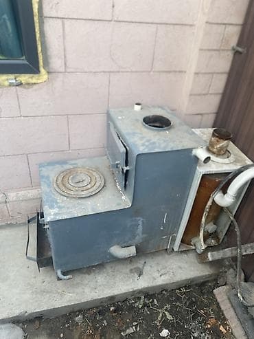 дрова продам: Печь-«буржуйка» с варочной поверхностью и выносным теплообменником - — 1