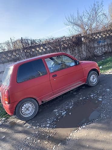 wagon r: Daihatsu Cuore: 2000 г., Бензин, Купе — 3