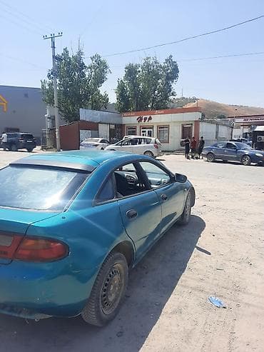mini cooper: Mazda 323: 1995 г., Хэтчбэк — 1
