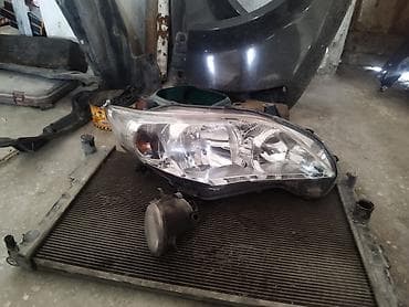 Системы освещения: Фара правая Toyota Corolla (E140/E150, рестайлинг, 2010–2013 фара — 1