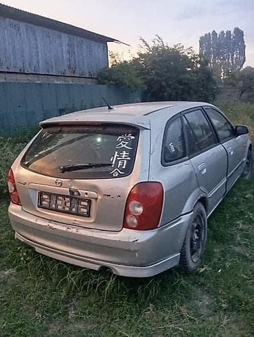 Mazda Familia: 2003 г., Универсал — 4