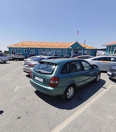 м руль g30: Mazda Familia: 2001 г., 1.6 л, Автомат, Бензин, Хэтчбэк — 4