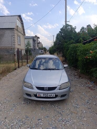 опел зафира б: Mazda 323: 2001 г., 1.6 л, Механика, Бензин, Хэтчбэк — 3