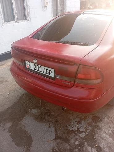 мото honda: Mazda Cronos: 1992 г., 2 л, Механика, Бензин, Хэтчбэк — 5