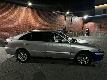 mazda 2: Mazda 626: 2000 г., 2 л, Механика, Бензин, Хэтчбэк — 7
