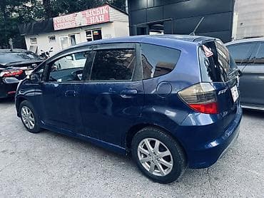 мото мини: Honda Fit: 2009 г., 1.5 л, Автомат, Бензин, Хэтчбэк — 4