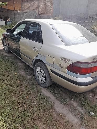 амортизатор lexus: Mazda 626: 1997 г., 2 л, Автомат, Бензин, Седан — 4
