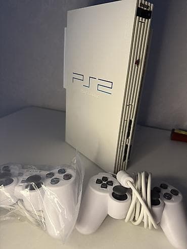 диски для ps2: PlayStation 2 FAT White Limited Edition + HDD 500 ГБ В комплекте — 4