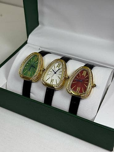 Женские наручные часы с асимметричным корпусом (форма «капля») в