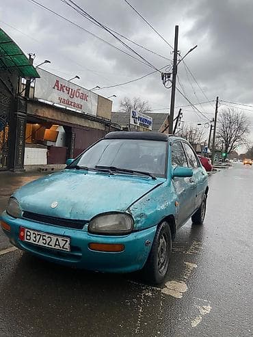 e53 4 8: Mazda 121: 1992 г., 1.3 л, Механика, Бензин — 3