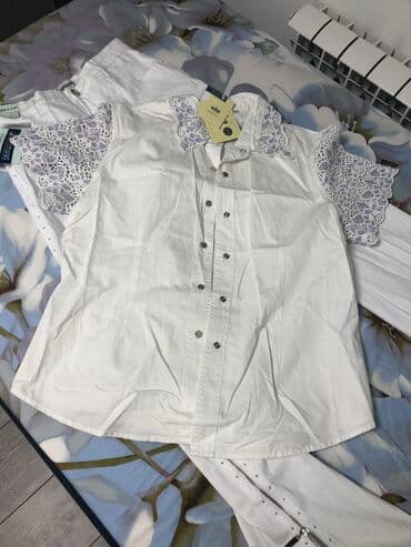 Костюм белый, очень красивый, новый, размер 48/50