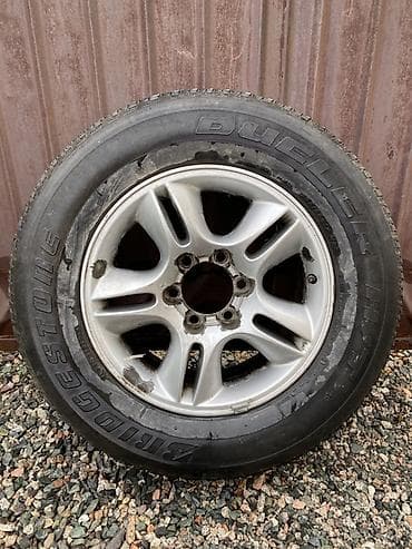 Литой диск с шиной Bridgestone Dueler - Размер шины: 265/65 R17 — 1