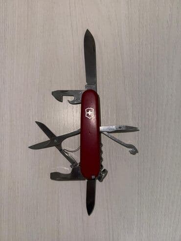 Музыкальные инструменты: Мультитулы и швейцарские ножи (набор) 1) Красный швейцарский нож — 2