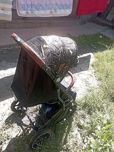 Коляски: Прогулочная коляска с большим капюшоном и кожаными вставками на — 2