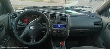 Унаа сатуу: Nissan Primera: 2001 г., 1.8 л, Кол менен иштөөчү, Газ, Универсал — 9