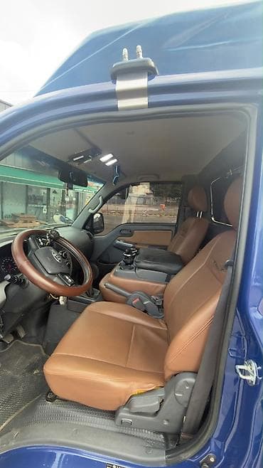 kil k5: Компактный грузовой бортовой автомобиль Kia (синего цвета) с — 4