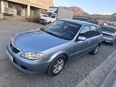 crown 204: Mazda 323: 2001 г., 1.6 л, Механика, Бензин, Хэтчбэк — 1
