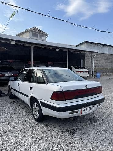 глушитель матиза: Daewoo Espero: 1995 г., 1.5 л, Ручные, Бензин, Седан — 6