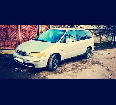 subaru 5: Honda Odyssey: 1997 г., 2.3 л, Автомат — 4