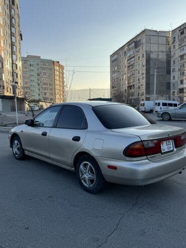 крыло нексия 1: Mazda 323: 1998 г., 1.5 л, Автомат, Бензиновая, Седан — 10