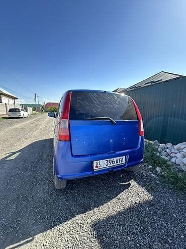 ist машина: Daihatsu Cuore: 2003 г., 1 л, Ручные, Бензин, Хэтчбэк — 8
