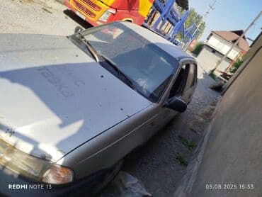 бампер на опель вектра б: Седан Daewoo Nexia серебристого цвета, оборудованный механической — 2