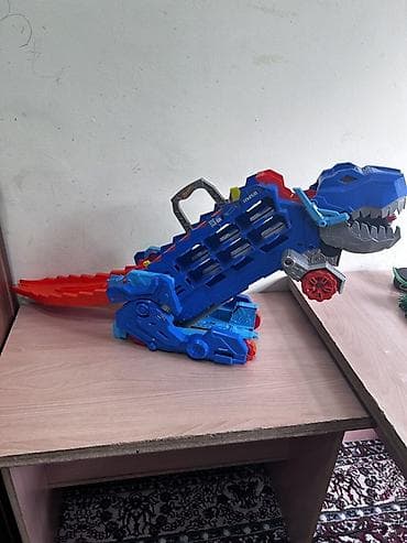 Детский мир: Игровой трек-переноска Hot Wheels “Тираннозавр” (HW68) оригинал — 2