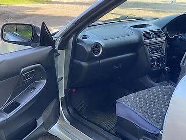 что за машина: Subaru Impreza: 2004 г., 1.5 л, Автомат, Газ, Седан — 2