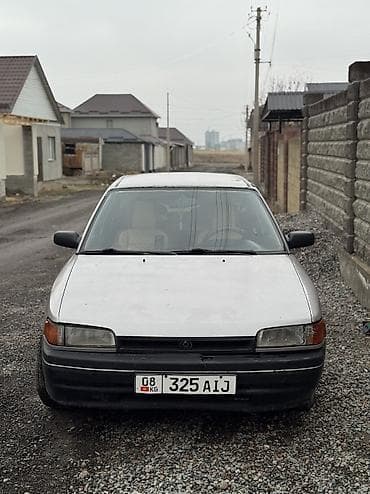 mazda 323 2003: Mazda 323: 1993 г., 1.6 л, Механика, Бензин, Седан — 1