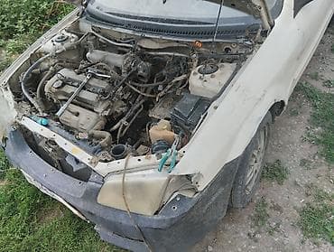 Mazda Familia: 1998 г., Автомат, Бензин, Седан — 2